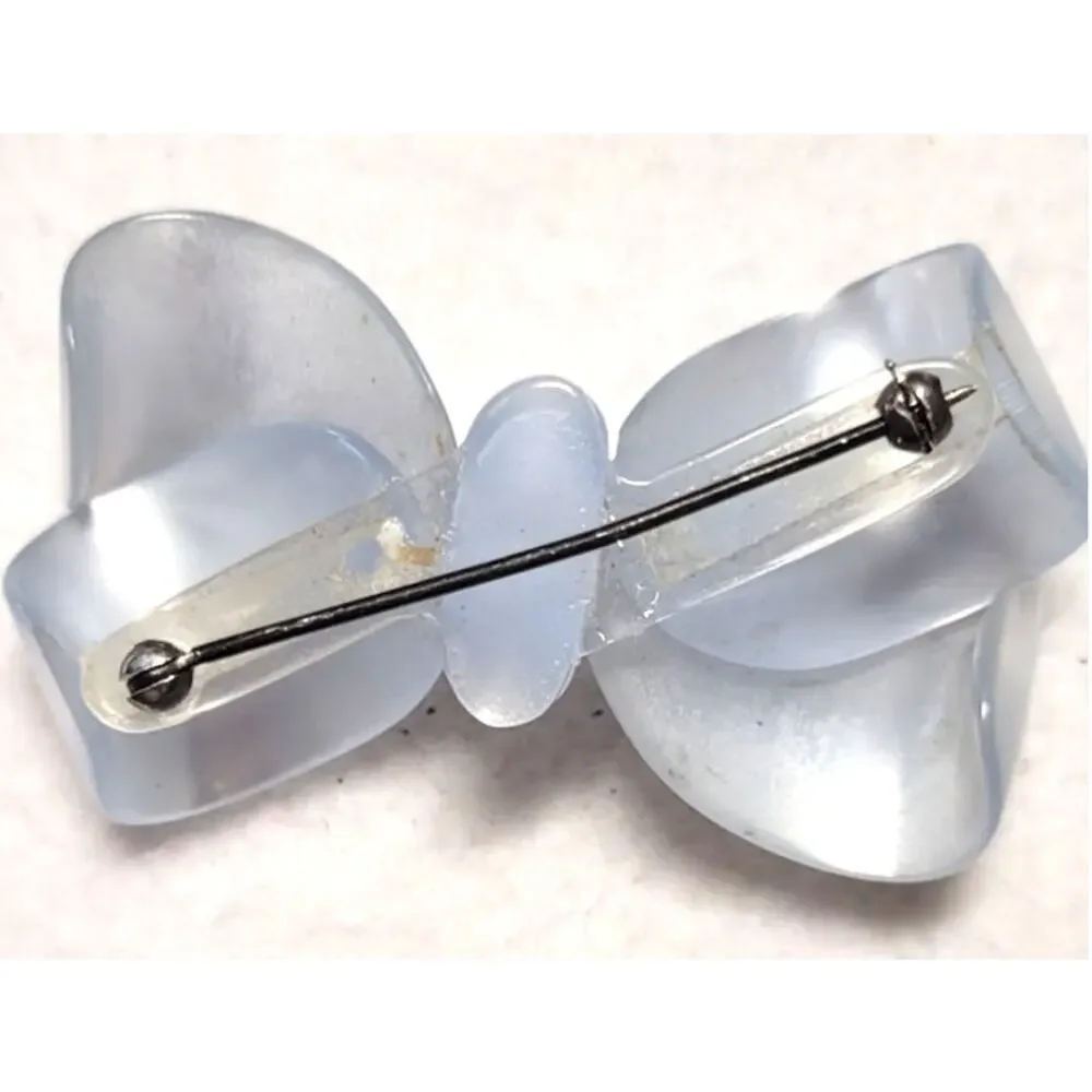 Vintage Baby Blue Grey Moonglow Lucite Bow Brooch Glowing Acrylic Ribbon Pin